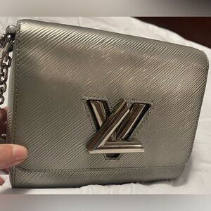 Louis Vuitton Epi Twist in silver with dust bag, COA, and Mirror